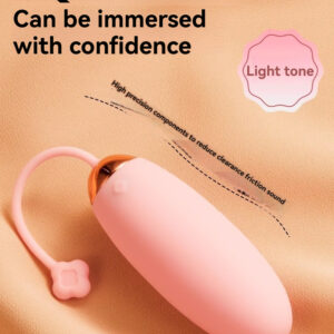 Elegant pink vibrator designet til diskret nydelse, med stille drift og kompakt bærbarhed.