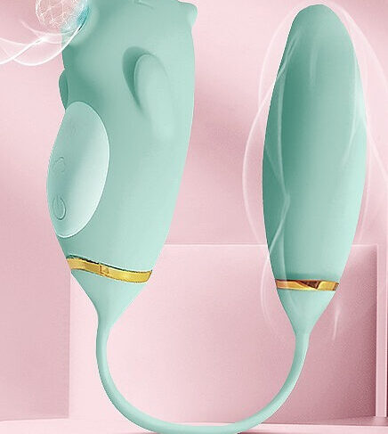 Elegante vibratore verde menta a doppio uso con lubrificante e custodia discreta, perfetto per il piacere personale.