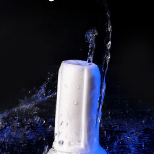 Sleek white soap dispenser with water splashes; easy to clean for ultimate hygiene.