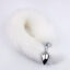 Elegant faux fur tail with metallic plug for playful fantasies and personal expression.