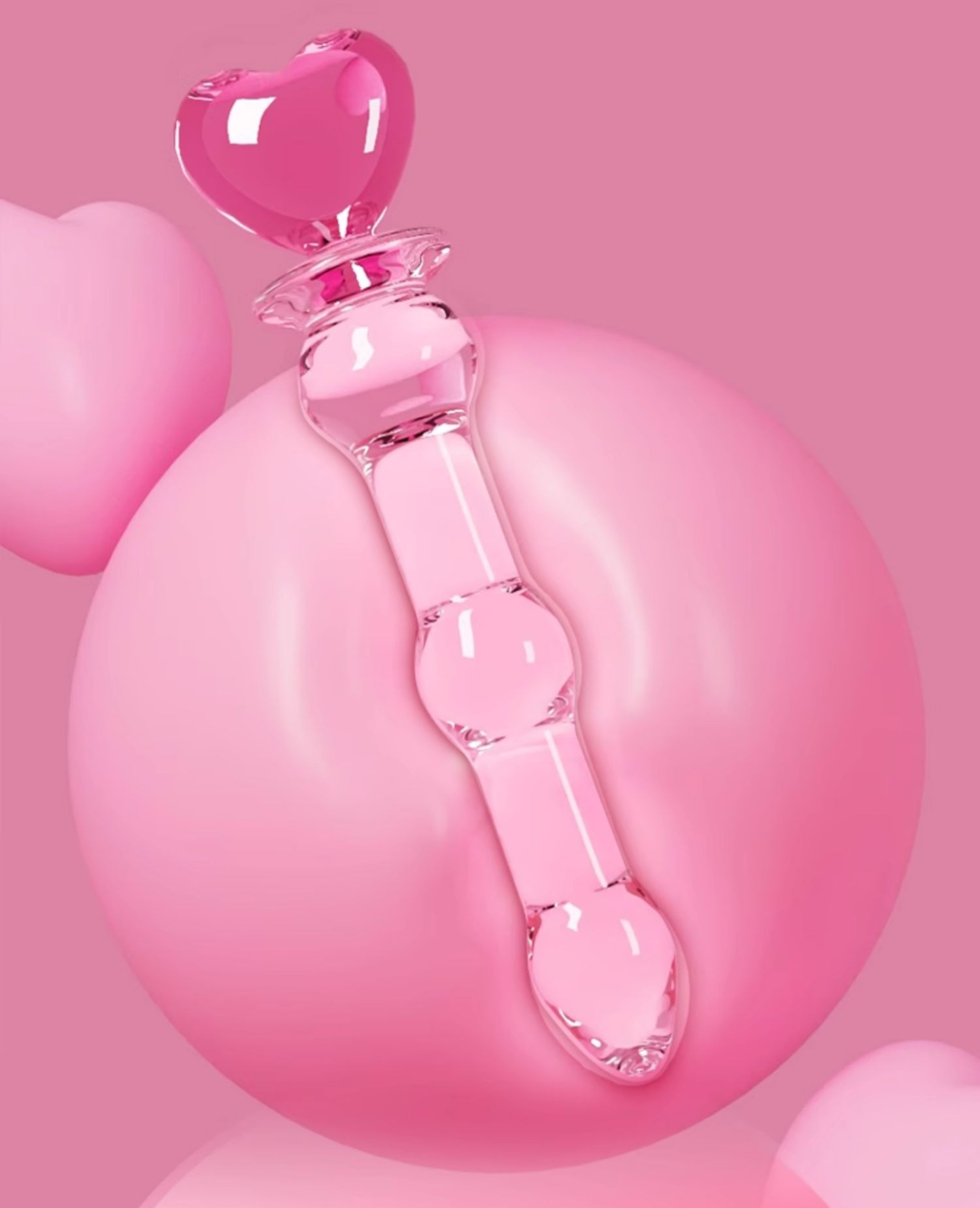 Lebendiges rosa herzförmiges Glasdesign, perfekt für spielerische Intimität und moderne Dekoration.