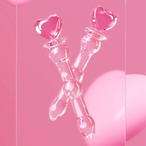 Playful heart-shaped glass toys in vibrant pink, symbolizing love and connection.