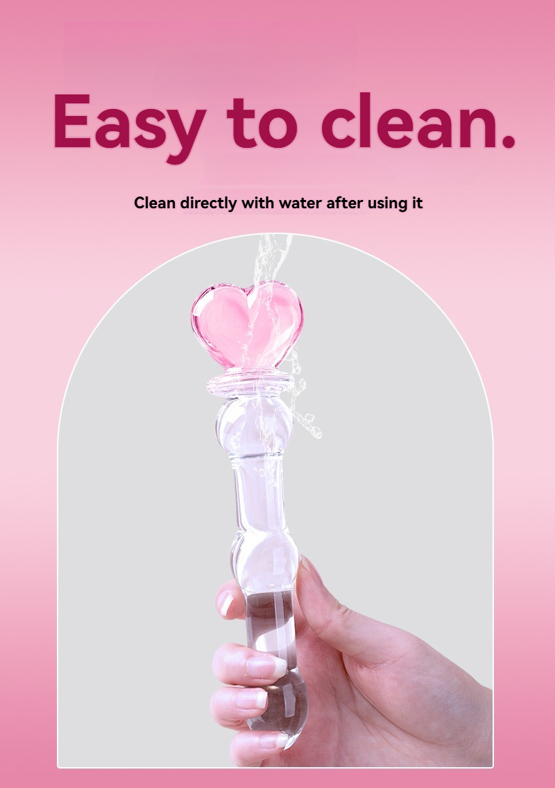 Elegant roze hartvormig glazen speeltje, gemakkelijk schoon te maken en ergonomisch ontworpen voor genot.