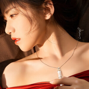 Elegant woman in red dress exuding confidence, allure, and sensuality—perfect for intimate moments.