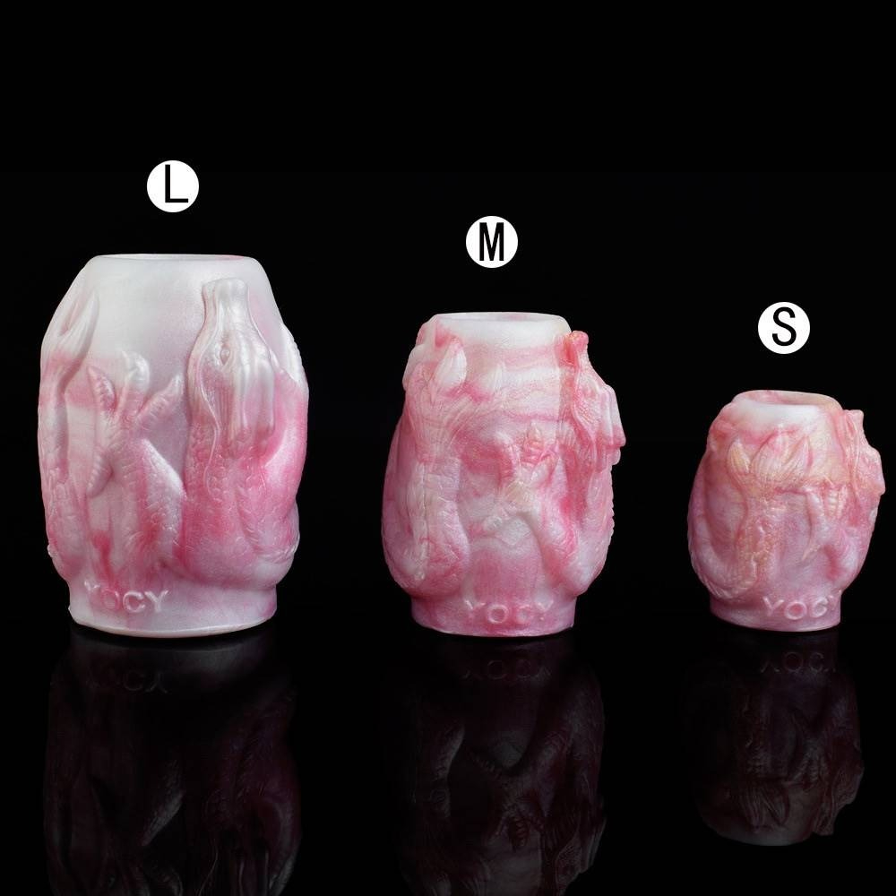 Elegant pink vases with marine carvings, perfect for home decor or unique gifts.