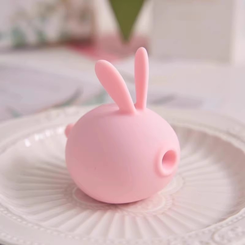 Charmant lapin en silicone rose, parfait pour une décoration ludique et des idées de cadeaux uniques.