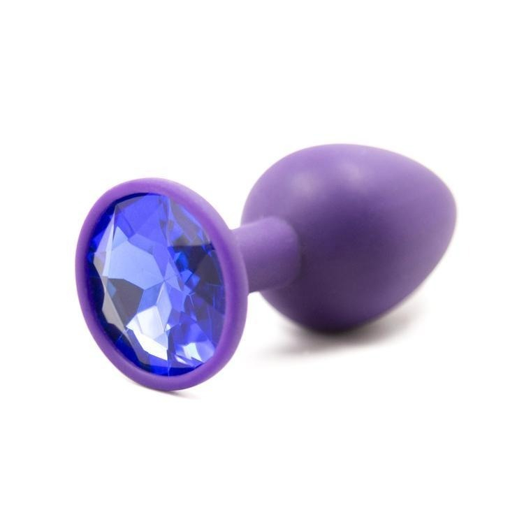 Elegante giocattolo per adulti in silicone viola con gemma blu per un piacere elegante e confortevole.