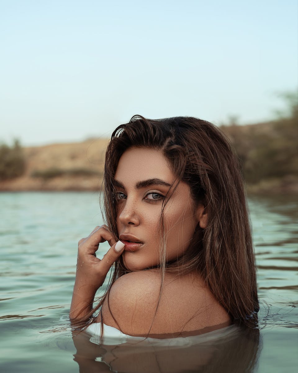 A captivating portrait of a woman in a Turkish lake, showcasing beauty and tranquility.
