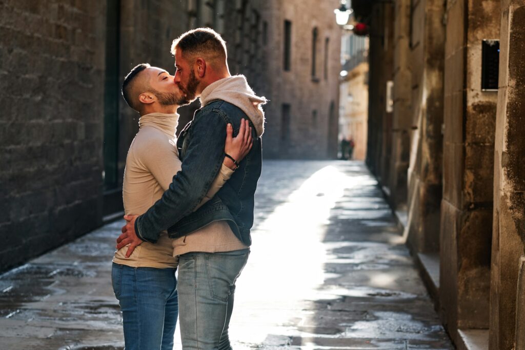 a young gay couple at Barcelona - gay concept