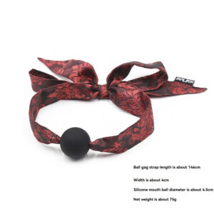 Stylish red satin ball gag with a black silicone ball for BDSM pleasure and restraint.