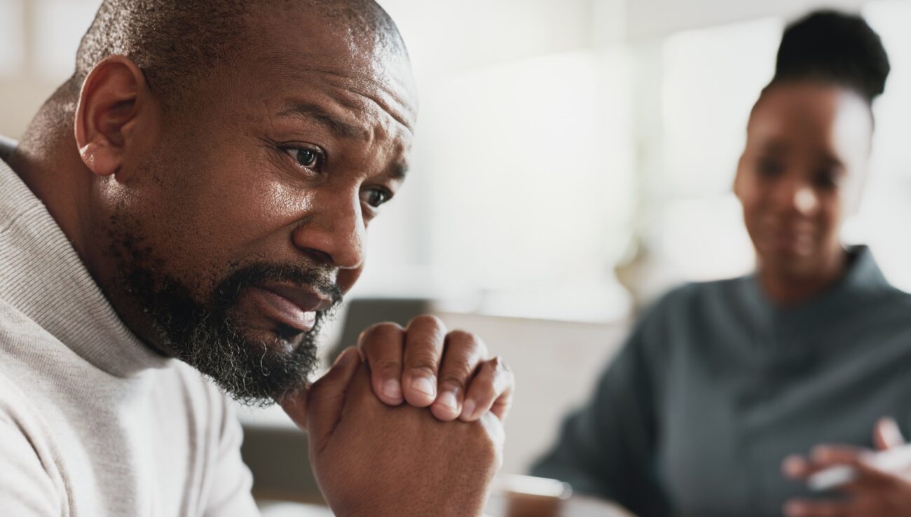 Black man, stress or therapy session with therapist for anxiety, help or mental health at appointme