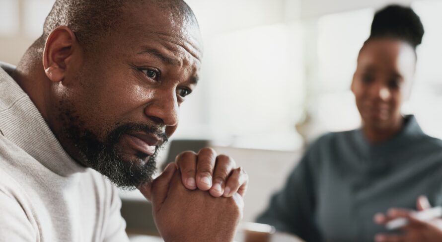 Black man, stress or therapy session with therapist for anxiety, help or mental health at appointme