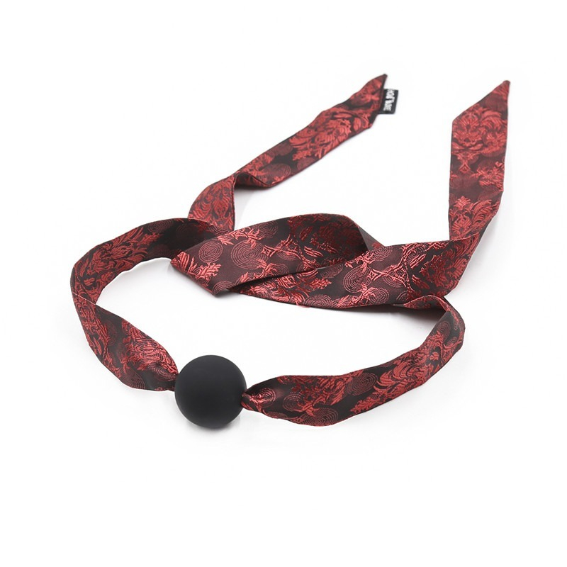 Elegant red and black ribbon accessory with satin finish, perfect for stylish outfits.