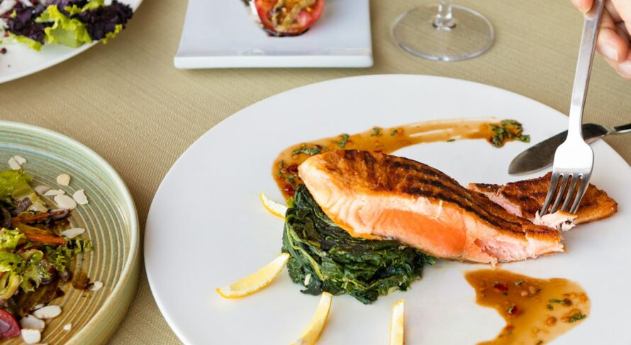 cooked fish on white ceramic plate