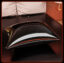 Sleek modern black pillow, stylish decor accent for luxurious, inviting bedroom comfort.