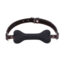 Stylish pet collar with black leather and playful bone centerpiece for fashionable pet lovers.