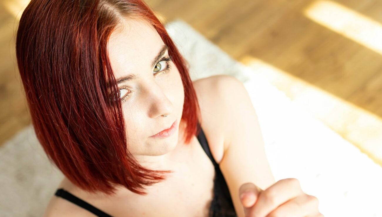 Red-Haired Beauty with Rope in Lingerie Sexy lady in bdsm outfit. Bdsm. sexy girl tied with rope.