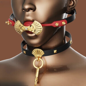 Bondage-inspired jewelry featuring a red gag and black leather choker on a mannequin head.