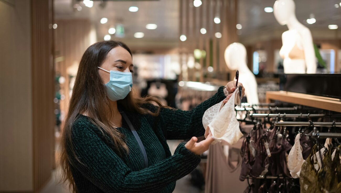 Woman choosing underwear in mall