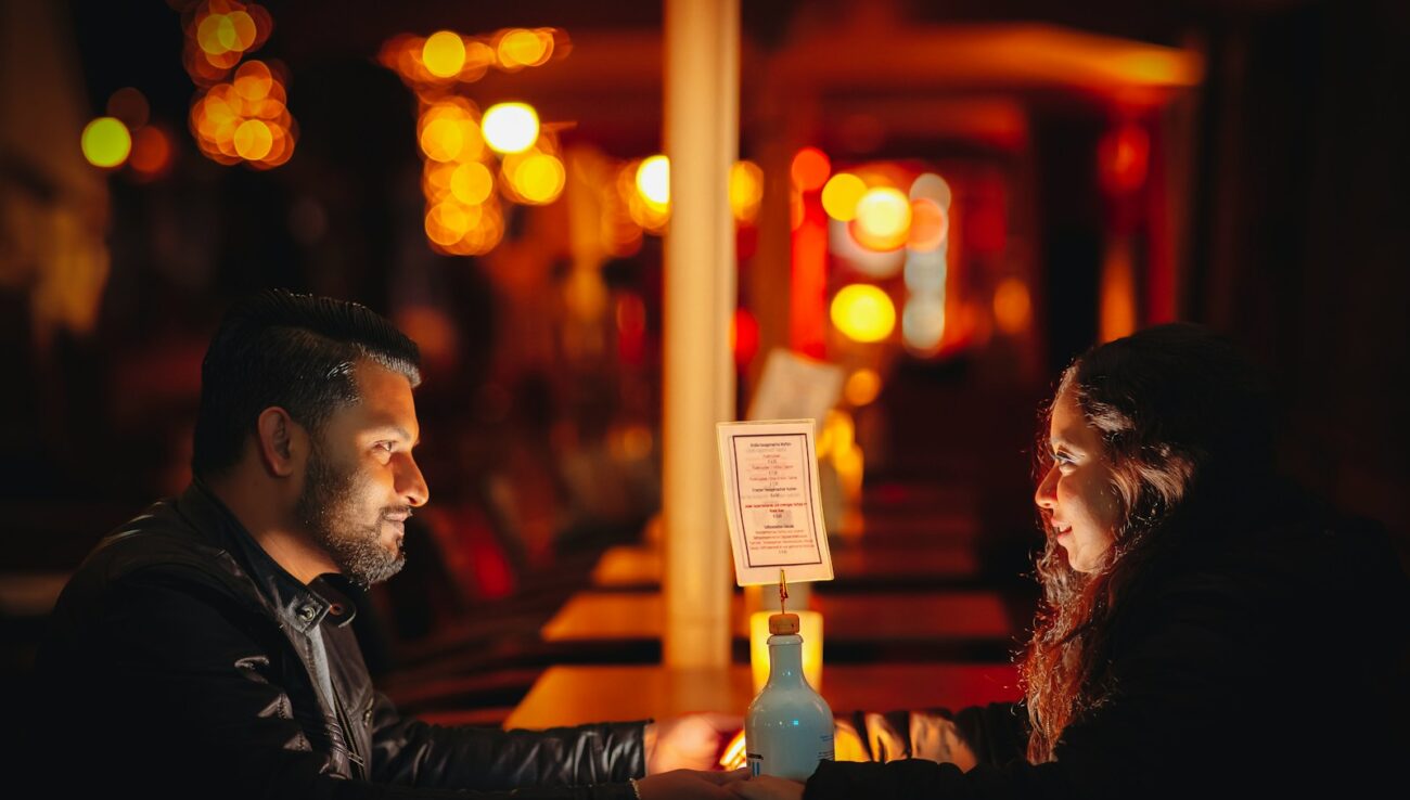 A man and a woman sitting at a table