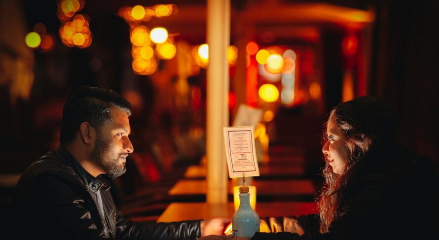 A man and a woman sitting at a table