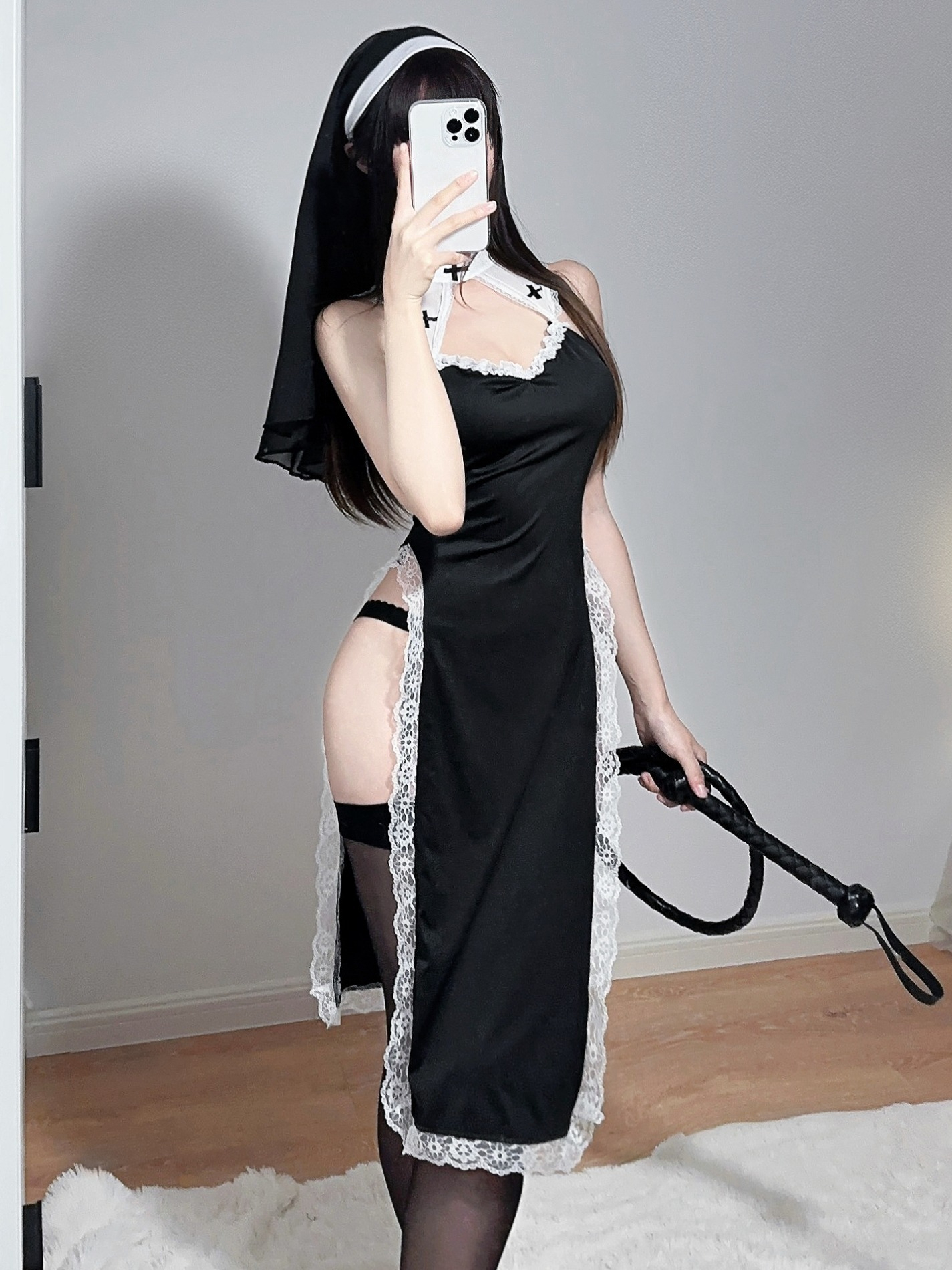 Provocative nun-inspired costume featuring lace details, thigh-high stockings, and playful accessories.