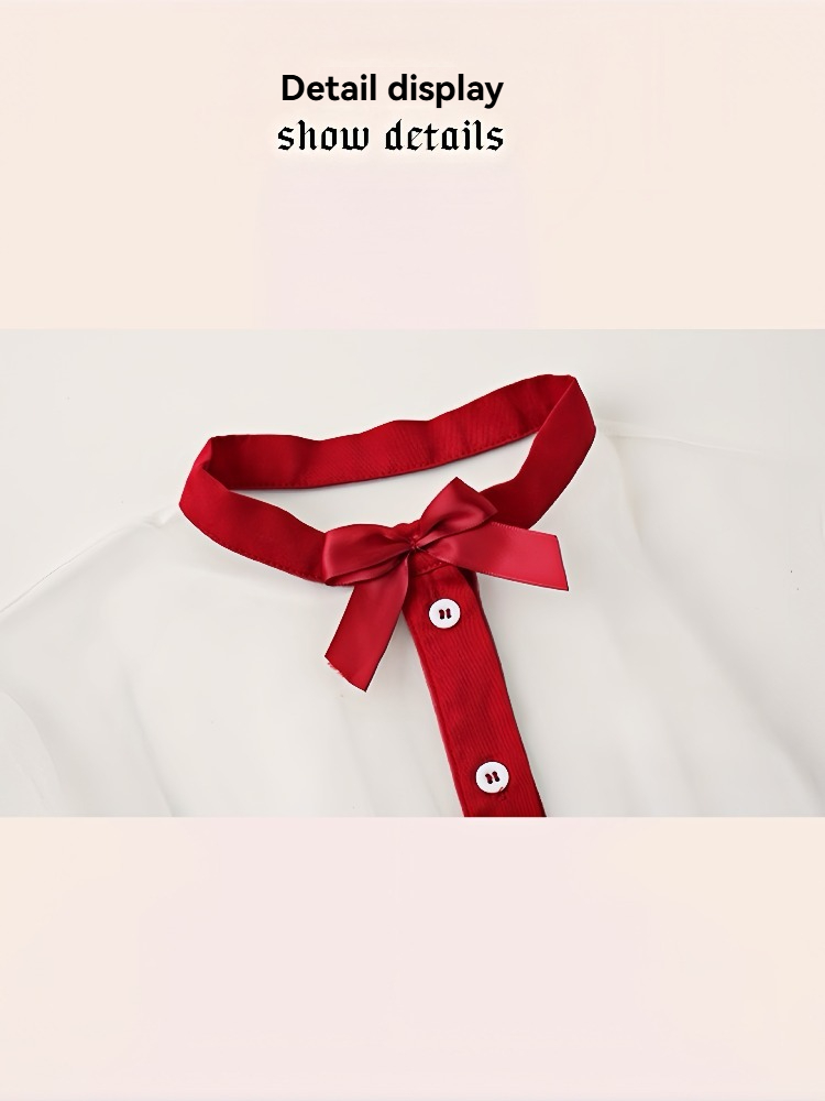 Elegant red-collared blouse with a charming bow detail and button-up front.