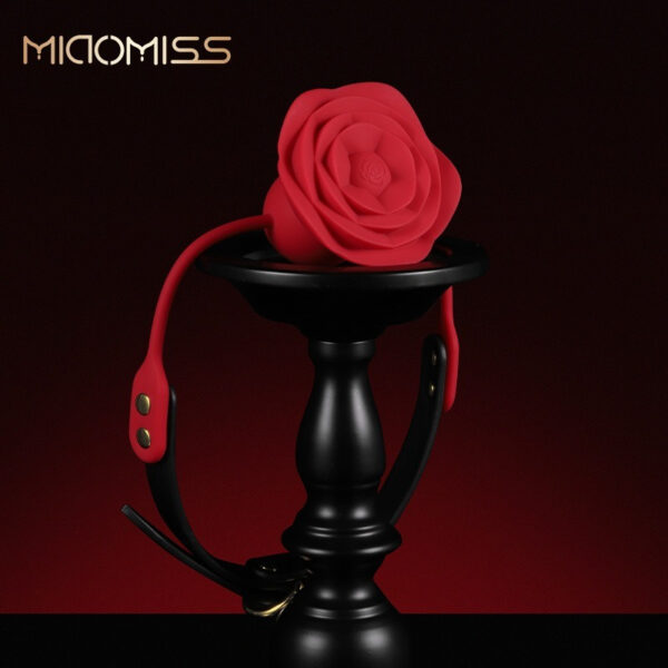 Stylish red silicone rose sculpture on a black pedestal, perfect for romantic decor or gifts.